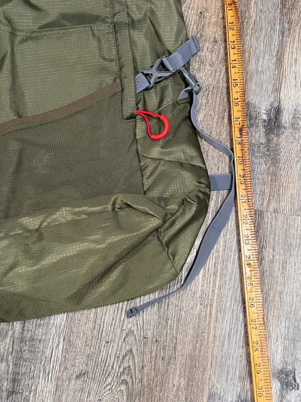 Outdoor Products green roll-top camping backpack